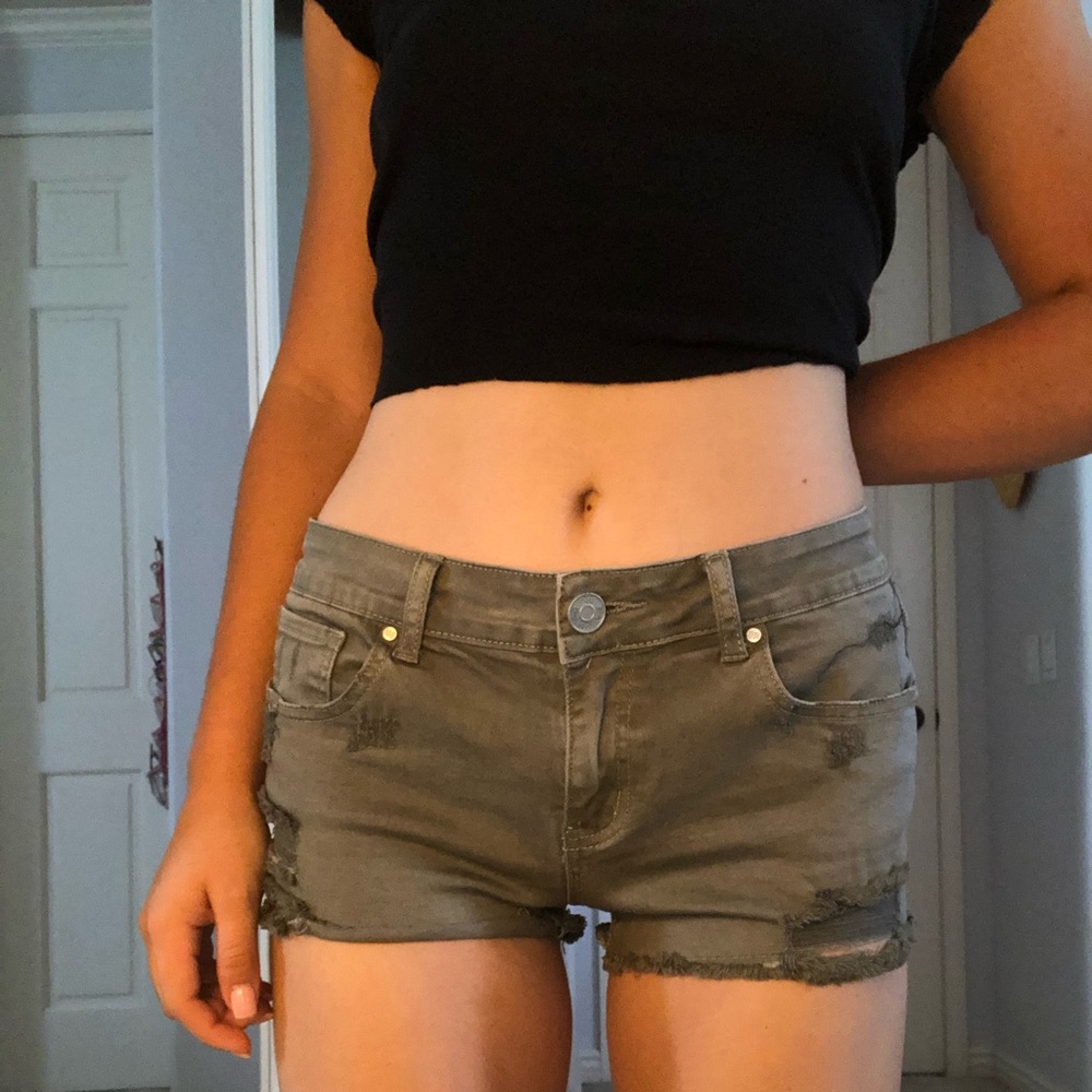 Low waisted army green distressed shorts
